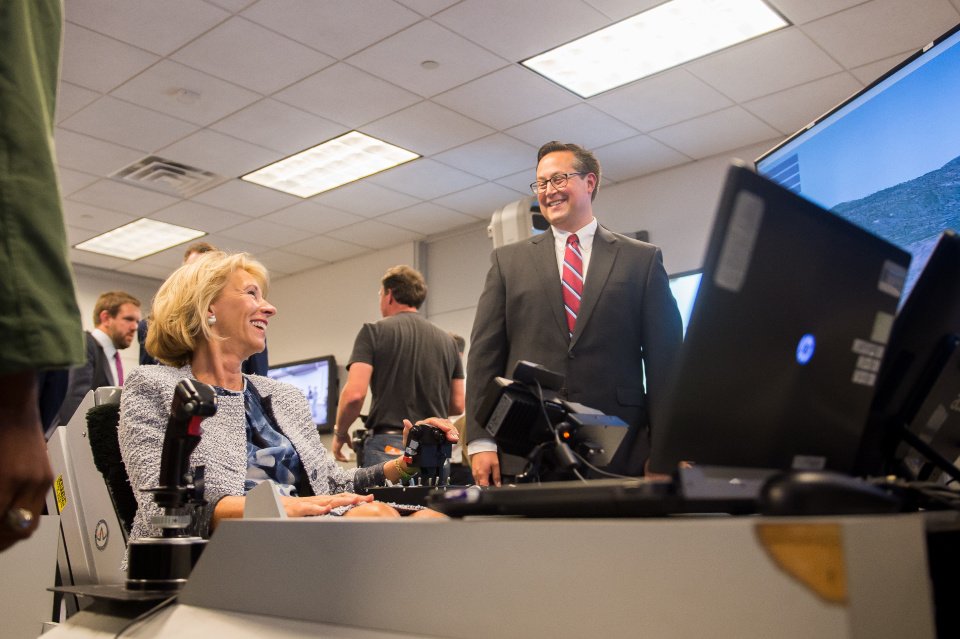 U.S. Secretary of Education Tries a ACME Dynamic Motion Seat